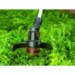 Black & Decker BLACK+DECKER 18V Trimmer ST182320 25cm Incl. 2,0Ah Accu + Lader -Gamma 123 1695