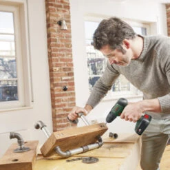 Bosch 18V Klopboormachine UniversalImpact (Incl. 2 Accu's 1.5Ah + Lader) 12 Bosch 18V Klopboormachine UniversalImpact (Incl. 2 Accu's 1.5Ah + Lader) -Gamma 123 183